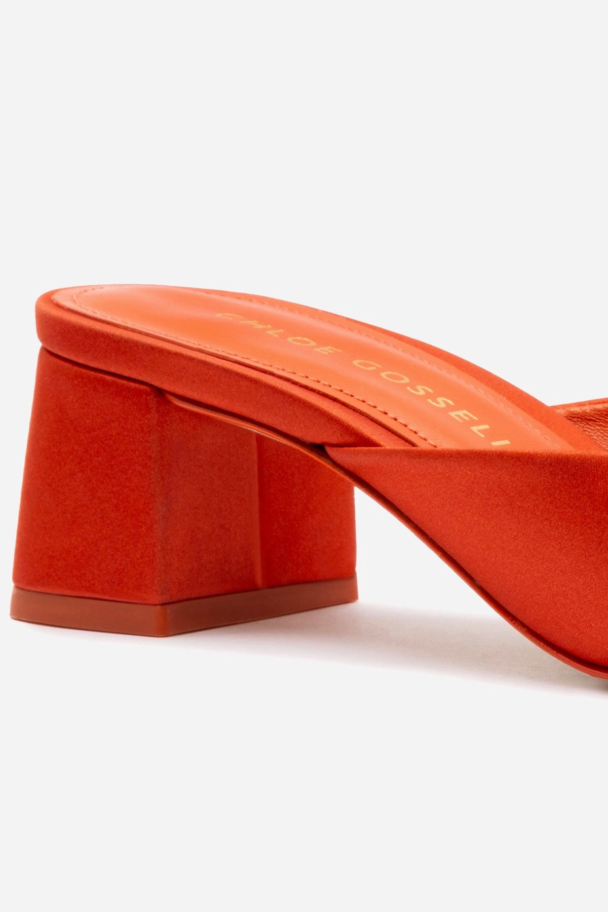 Chloe Gosselin by Larroudé Anah Mule In Orange Sunrise Satin